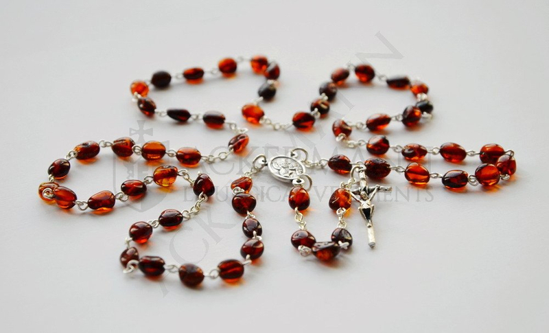 Silberroter Rosenkranz mit dunklen baltischen Bernsteinen